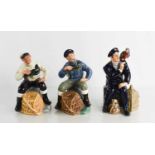Three Royal Doulton figurines comprising The Lobster Man in blue jersey, HN2317, The Lobster Man