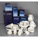 A quantity of Aynsley ceramics to include lamp base, jars, trinket boxes in the form of rabbit,