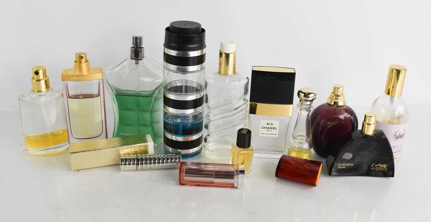 A group of vintage perfume bottles, some with contents to include Ardenbeauty, Channel No5,
