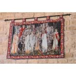 A large medieval style tapestry wall hanging, with wrought iron pole, the tapestry depicting figural