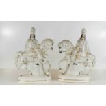 A pair of 19th century flat back Staffordshire figures on horseback, 37cm high.