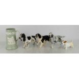 A group of four Royal Doulton Beswick dogs comprising English Setter, number HN1050, Springer