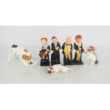 A group of Royal Doulton figures comprising Dickens Mr Micawber, Tiny Tim, David Copperfield, and