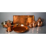 A group of Victorian and Art Nouveau period copperware to include tray, colander, chocolate pot, and