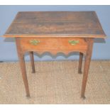 An 18th century oak low-boy with two drawers and brass handles.