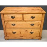 An antique pine chest of two short over three long drawers, 81cm by 99 by 46cm
