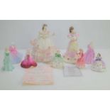 A group of Coalport porcelain figurines to include "Togetherness a Gift of Love" number 380 of 2000,