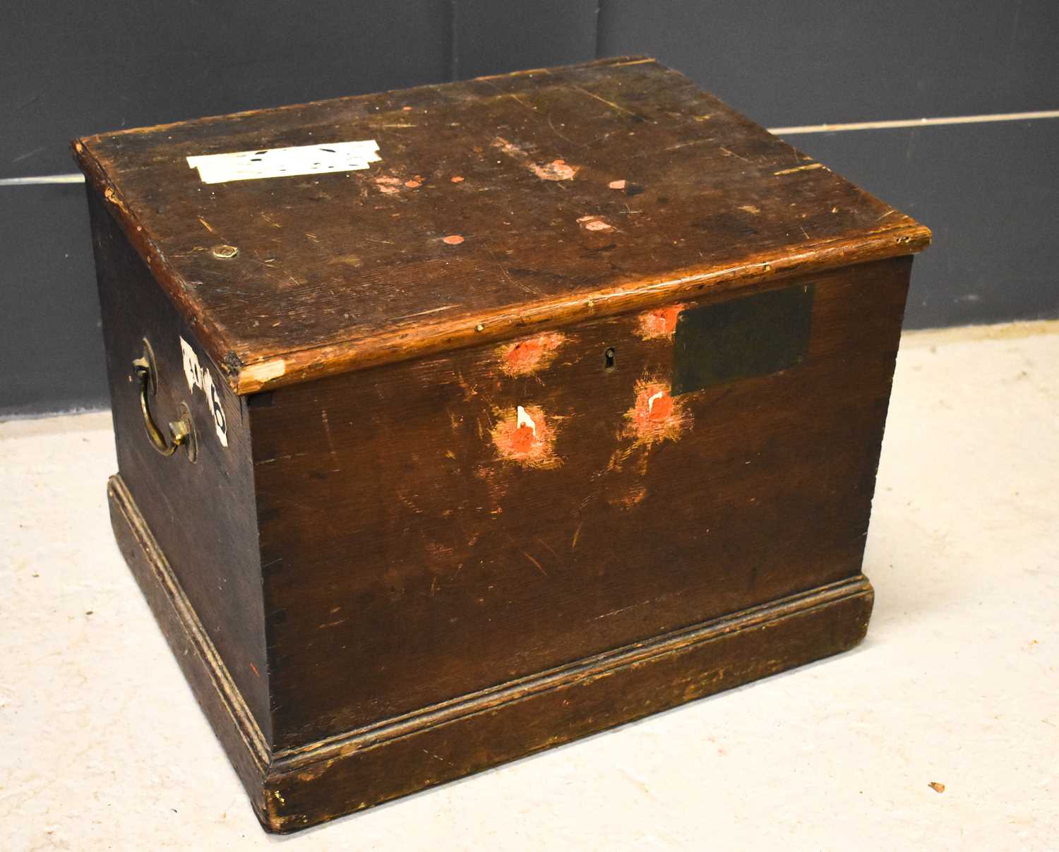 A Victorian oak travelling chest with twin handles and inner drop in shelf with compartments,
