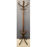A dark bentwood coat stand by Withy Grove Stores, 24 and 26 Whitechapel Liverpool, 190cm high.