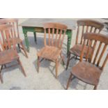 A Victorian pine kitchen table with single drawer and five kitchen chairs.