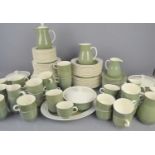 A large Wedgwood dinner service in the "Moss Green" pattern to include tureens, plates, milk jug,