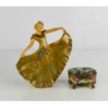 An Art Deco pottery dancing lady, and a small painted trinket box, both A/F