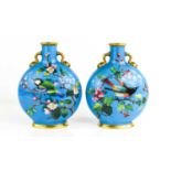 A pair of fine porcelain Minton moon flasks, with a blue celeste / turquoise ground, impressed