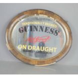 A vintage Guinness advertising mirror, St James gate Dublin.