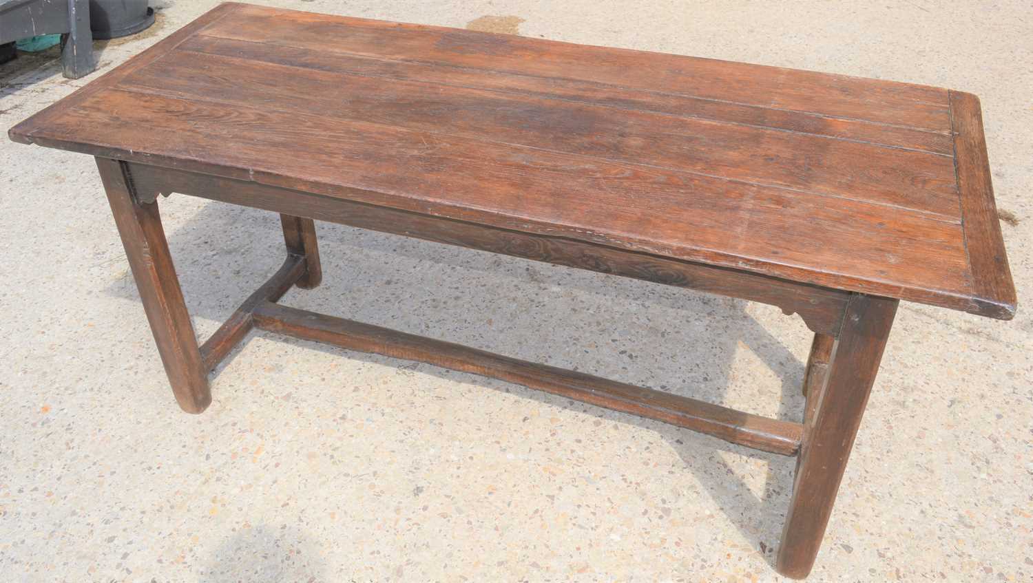 A late 18th century oak refectory table. - Image 2 of 4
