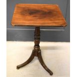 A George III mahogany square tilt top occasional table, on gun barrel support and three swept