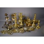A group of copper to include Victorian horse brasses, jugs, pairs of candlesticks and other items.