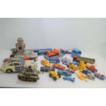 A large group of diecast and tinplate vehicles to include various Corgi, DRGM Gama Tank, Presto