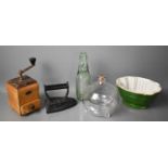 A group of kitchenalia collectables comprising a glass wasp trap, a jelly mould, a grinder, an