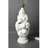 An Italian pottery fruit form white porcelain lamp base, 46cm high.