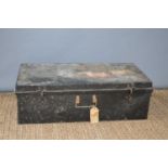 An early 20th century metal steamer trunk.