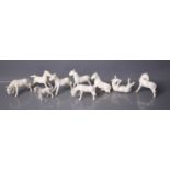A group of Chinese miniature porcelain horses.