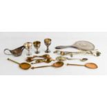 Five silver Chinese 'bamboo' form spoons, two silver egg cups, a silver Sherry bottle tag, silver