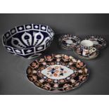 A group of Imari pattern Royal Crown Derby style platter, cup and saucers, side plates and a large