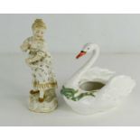 A porcelain swan salt, with green ribbon to the neck below beaded collar and hand painted face,