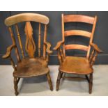 Two late 19th century elm country kitchen chairs one with a pierced splat back.