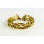 A vintage gold plated wavy gate-link bracelet, approximately 18cm long.