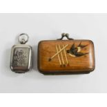 An unusual vintage olive wood vesta or match case, of purse form, with swallow and matches to the