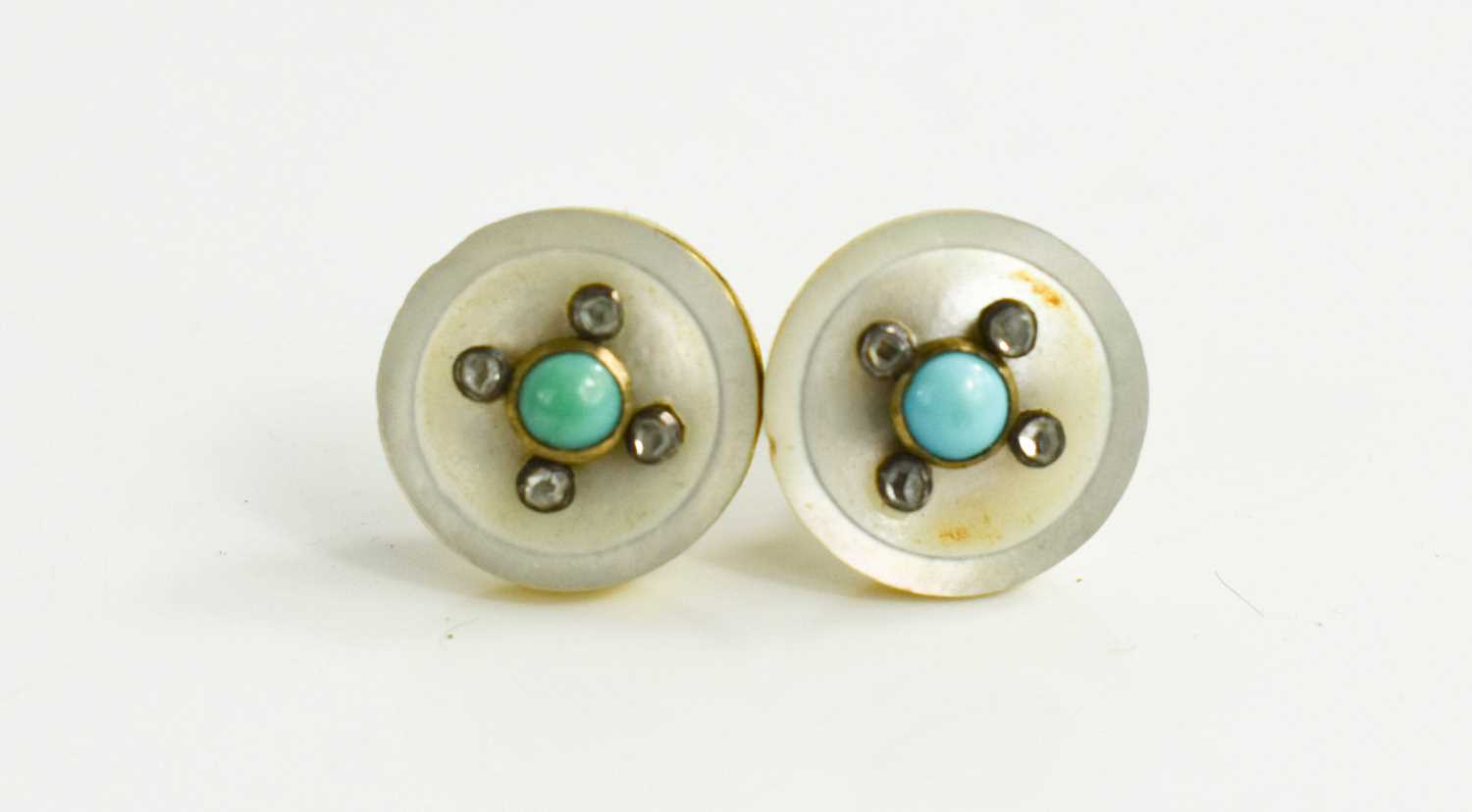 A pair of 19th century, likely Georgian diamond and turquoise studs, with central turquoise