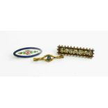 A group of three vintage brooches, comprising a micromosaic rectangular example with beaded edge, an