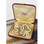 A cultured pearl necklace with a 9ct gold clasp, 19.63g.