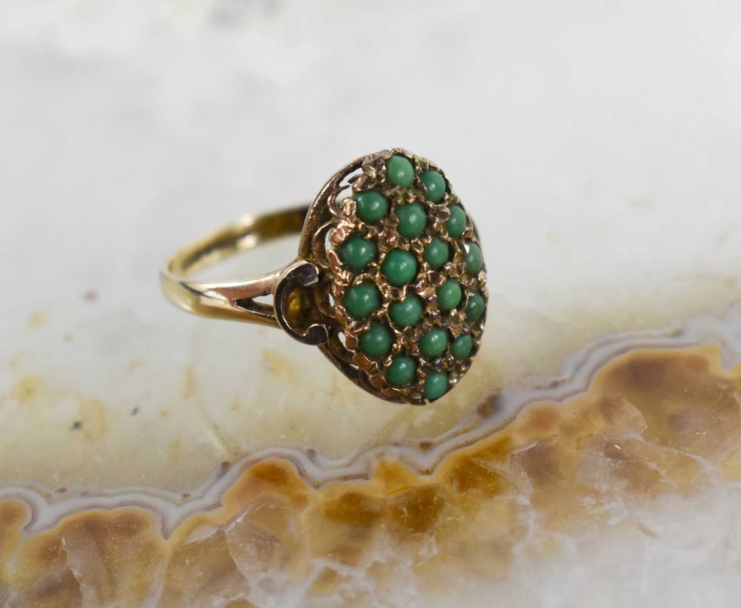 A vintage 9ct gold ring, the large marquise shaped setting with eighteen jade cabouchons, size O, - Bild 3 aus 3