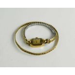 A 9ct gold cased lady's wrist watch with plated expandable bracelet strap, 14.73g total weight,