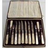 A 19th century set of mother of pearl handled and silver plated pickle knives and forks, in