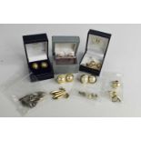 A group of four pairs of 9ct gold earrings, comprising three pairs set with pearls and a pair of