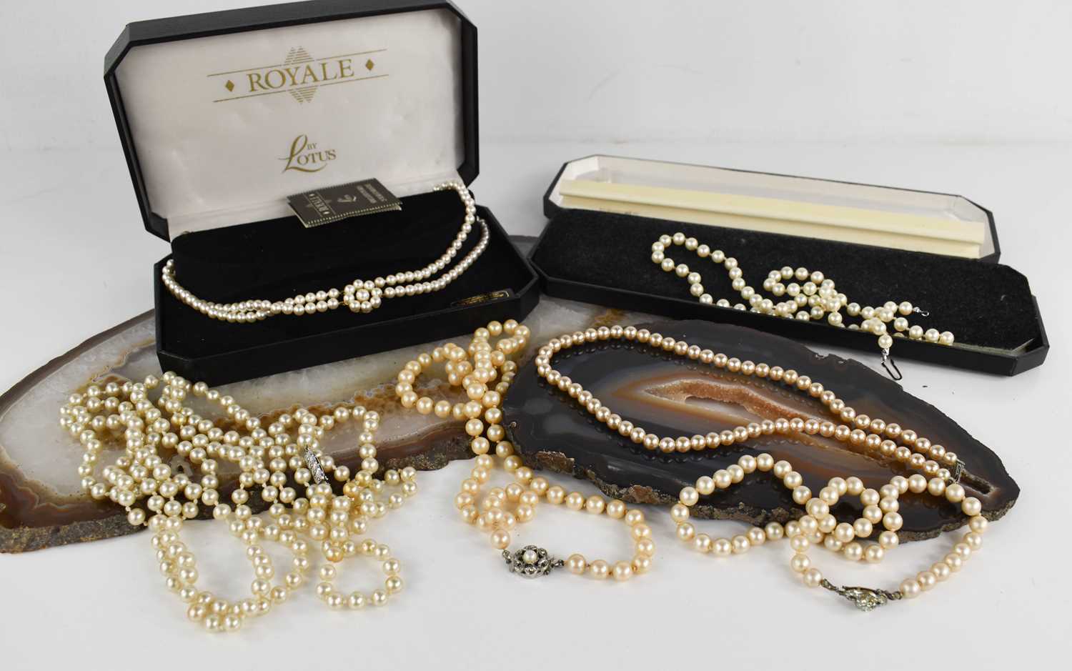 A group of pearl necklaces, including vintage examples. and one Royale by Lotus choker, in the