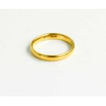 A 22ct gold wedding band, size Q, 4.03g.Wear generally, and hallmarks worn, tested as 22ct.