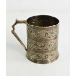 A 19th century silver christening tankard, embossed with bands of scrollwork, Sheffield 1845,