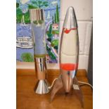 Two vintage lava lamps to include one in the form of a rocket.