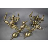 Three pairs of silvered Belgium wall lights with twin scrolling branches raising candle sockets