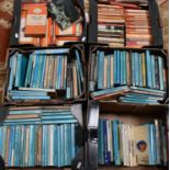 A large quantity of penguin books to include blue and orange covers.