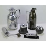 Two Art Deco "No Fume" bakelite ashtrays together with a chrome coffee grinder, a chrome desk