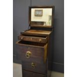 A George IV mahogany military travelling / campaign vanity chest with brass inset corners, hinged