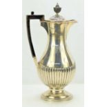 An Edward VII silver coffee pot, baluster form with part reeded decoration, hallmarked Goldsmiths