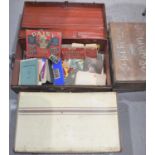 A vintage metal trunk together with a smaller example and a group of vintage ephemera to include