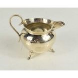A modernist designed Mappin & Webb Victorian silver cream jug, in the manner of Christopher Dresser,